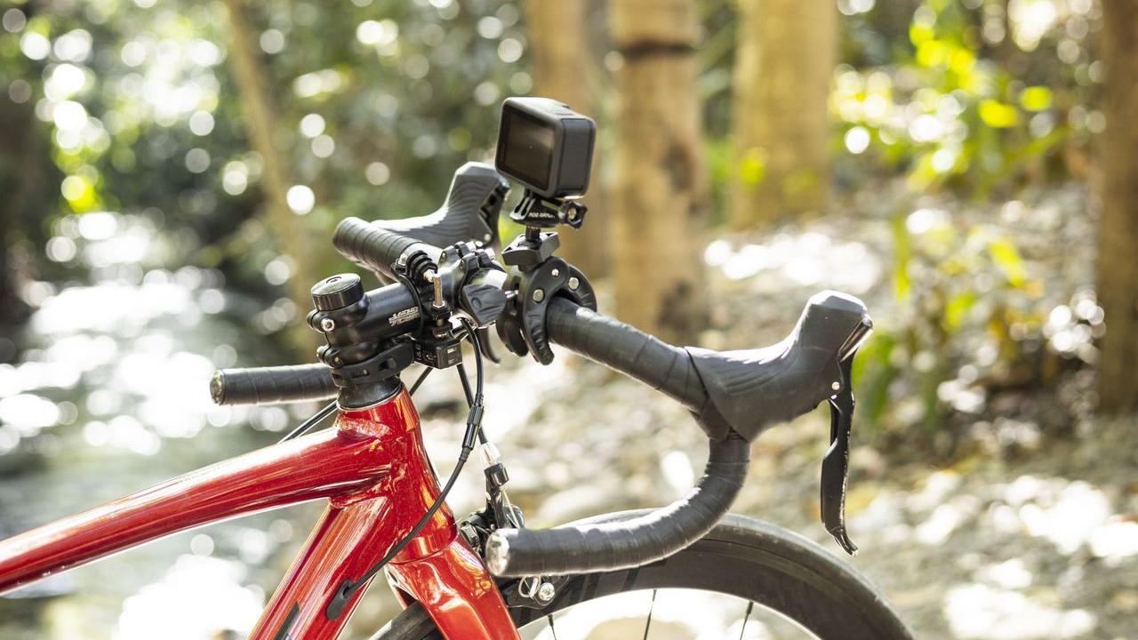 GoPro camera mounted to handlebar camera mount on bike