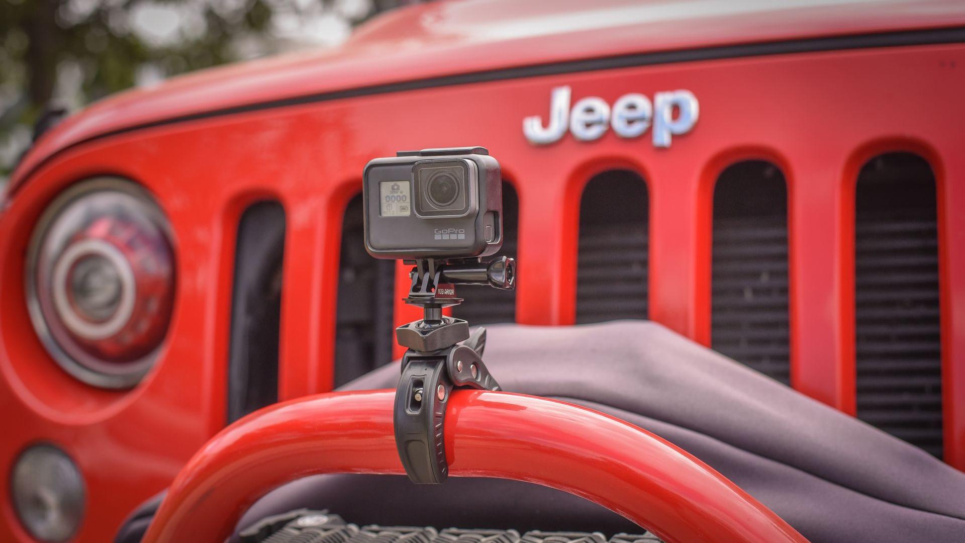 GoPro mounted to Action Cam Claw attached to front of Jeep